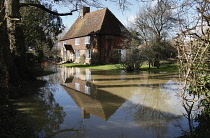 Climate, Weather, Flooding, House with flooded Garden, Headcorn, Kent, England.