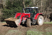 Climate, Weather, Flooding, Mechanical digger widening stream after it burst its banks.