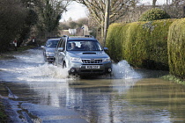 Climate, Weather, Flooding, Cars driving through floodwater.