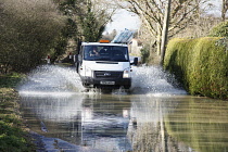 Climate, Weather, Flooding, Cars driving through floodwater.