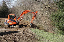 Climate, Weather, Flooding, Mechanical digger widening stream after it burst its banks.