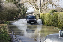 Climate, Weather, Flooding, Cars driving through floodwater.