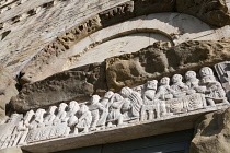 Italy, Tuscany, Lucca, Barga, Frieze above the side door to the Duomo Cathedral.