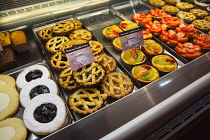 Italy, Tuscany, Lucca, Barga, Display of pastries in Luchessi's bar and cafe.