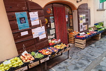 Italy, Tuscany, Lucca, Barga, Display of fruit and vegetable in front of a grocer's .