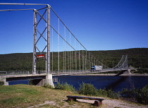 Norway, Finnmark, Transport, Suspension bridge across the Tana River carrying the E6 Highway towards the town of Kirkenes.