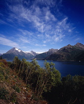 Norway, Nordland, Nordfjorden, View across fjord towards Helgaland Bukken mountains on north side of Svartisen Glacier.