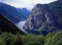 Norway, Sogn og Fjordane, Aurlandsfjorden, View over fjord and steep  eroded mountainsides from above the village of Flam.