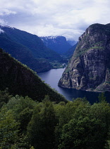 Norway, Sogn og Fjordane, Aurlandsfjorden, View over fjord and steep  eroded mountainsides from above the village of Flam.