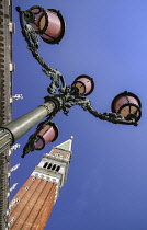 Italy, Venice, Piazzetta San Marco, Campanile di San Marco, St Mark's Campanile or bell tower with a street lamp.
