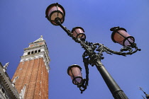 Italy, Venice, Piazzetta San Marco, Campanile di San Marco, St Mark's Campanile or bell tower with a street lamp.