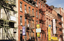 USA, New York, Manhattan, Chinatown, Typical buildings with fire escapes.