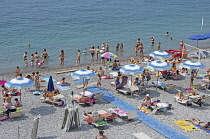 Italy, Campania, Amalfi Coast, Amalfi Town beach crowded with families