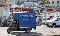 Italy, Campania, Amalfi Coast, Capri, Three wheeled van on the harbour front.
