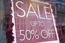 Business, Shops, Shopping, Sale signs in window display.