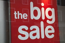 Business, Shops, Shopping, Sale signs in window display.