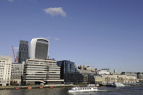 England, London, The view over the River Thames to the Modern Skyline of City of London with the Walkie Talkie and Cheesegrater Buildings.