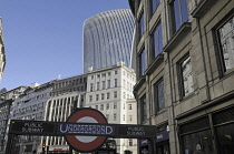 England, London, Entrance to Monument Tube Station with the skyline of the City of London including the Walkie Talkie Building. Editorial Use Only**