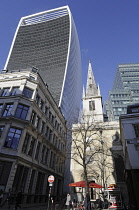 England, London, Saint Margaret Pattens church and street cafe in Rood Lane with The Walkie Talkie Building in background.