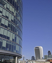 England, London, The view over the River Thames to the Modern Skyline of City of London with the Walkie Talkie and Cheesegrater Buildings from More London.