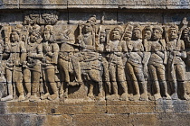 Indonesia, Java, Borobudur, Buddha travelling on a horse, accompanied by armed soldiers.