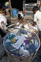 India, Maharashtra, Mumbai, Clothes soaking before being soaped and thrashed, Mahalaxmi dobhi ghat.