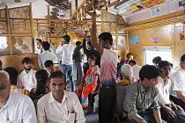 India, Maharashtra, Mumbai, Interior of second class carriage of a surburban train.