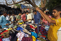 India, Maharashtra, Mumbai, Outdoor clothes market near Churchgate Station.