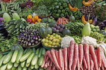 India, West Bengal, Calcutta, Wide selection of locally grown, vegetables on sale in a streeet market.