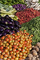 India, West Bengal, Calcutta, Colourful selection of locally grown vegetables on sale in street market.