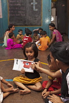 India, Maharashtra, Mumbai, Muskan, meaning 'smile' in Hindi, kindergarten in Dharavi slum, run by NGO Reality Cares.