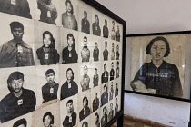 Cambodia, Phnom Penh, Victims' photos, including one of a sad mother and probably her dead baby, at Toul Sleng Genocide Museum Security Prison-21 S-21. Toul Sleng was a high school, taken over by the...