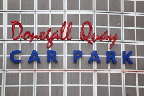 Ireland, North, Belfast, Neon sign on the exterior of the Donegall Quay multistorey car park.