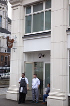 Ireland, North, Belfast, Cathedral Quarter, Kitchen staff outside the Potted Hen restaurant in St Annes Square.