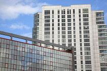 Ireland, North, Belfast, Modern apartment block next to river Lagan.