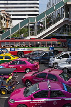 Thailand, Bangkok Gridlocked street including 3 pink taxis.