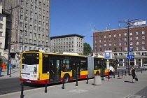 Poland, Warsaw, Plac Powstancow Warzawy, Public bus at stop.
