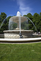Poland, Warsaw, Marszalkowska, Ogrod Saski, Water fountain in public park.
