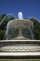 Poland, Warsaw, Marszalkowska, Ogrod Saski, Water fountain in public park.