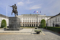 Poland, Warsaw, Ul Krakowskie Przedmiescie or The Royal Way, Radziwill Palace, Presidential Residence with a statue of Prince Józef Poniatowski in front.