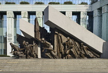 Poland, Warsaw, Monument to the Warsaw Uprising, another section of the monument showing a group of Polish insurgents actively engaged in combat.