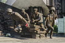 Poland, Warsaw, Monument to the Warsaw Uprising, another section of the monument showing a group of Polish insurgents actively engaged in combat.