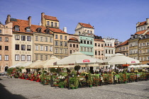 Poland, Warsaw, Stare Miasto or Old Town Square, West side of the square with open air restaurant.