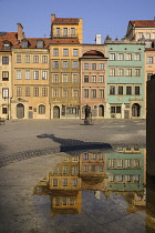 Poland, Warsaw, Stare Miasto or Old Town Square, West side of the square with shadow of the statue of Syrenka or The Mermaid of Warsaw in the centre.