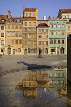 Poland, Warsaw, Stare Miasto or Old Town Square, West side of the square with shadow of the statue of Syrenka or The Mermaid of Warsaw in the centre.