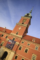Poland, Warsaw, Royal Castle in Plac Zamkowy or Castle Square, facade and clock tower.