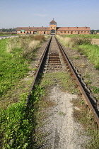 Poland, Auschwitz-Birkenau State Museum, Birkenau Concentration Camp, Railway tracks leading to the camps main SS guard gate.