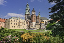 Poland, Krakow, Wawel Hill, Tour group gather outside Wawel Cathedral.