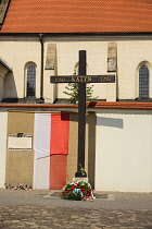 Poland, Krakow, Church of St  Giles with Katyn Memorial Cross out in front.