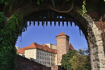 Poland, Krakow, Wawel Hill, Wawel Castle, An artillery tower view through gateway.
